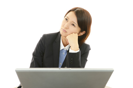 Tired and stressed young  business womanの写真素材