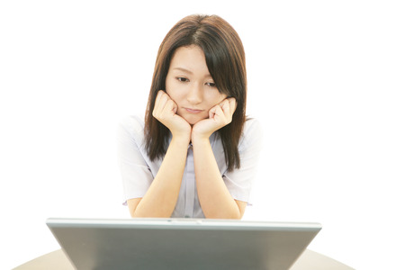 Tired and stressed young  business womanの写真素材