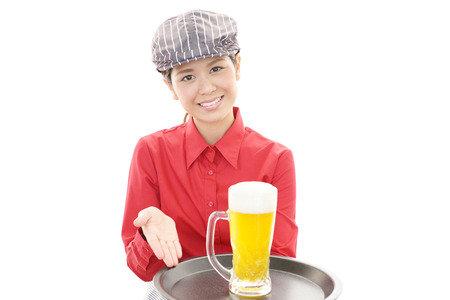 Smiling young waitressの写真素材