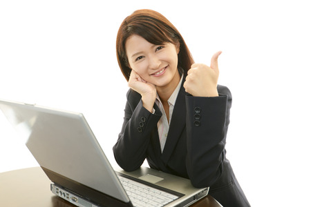 The female office worker who enjoy workの写真素材