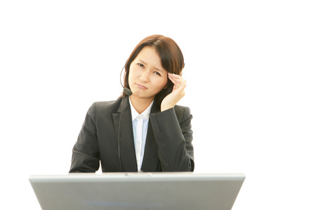Tired call center operatorの写真素材