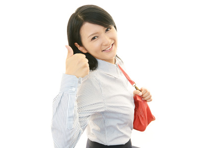 A woman who smiling happyの写真素材