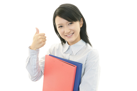 A woman who smiling happyの写真素材