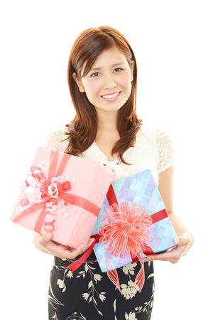 The woman who smiles with a giftの写真素材