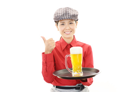 Smiling young waitressの写真素材