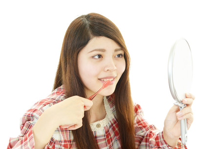The woman who brushes her teethの写真素材