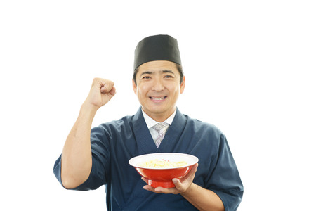 Asian chef with noodleの写真素材