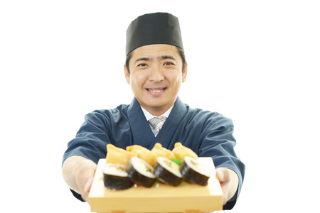 Portrait of a sushi chefの写真素材