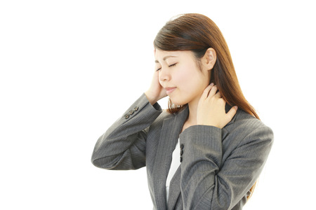 Business woman with shoulder pain の写真素材