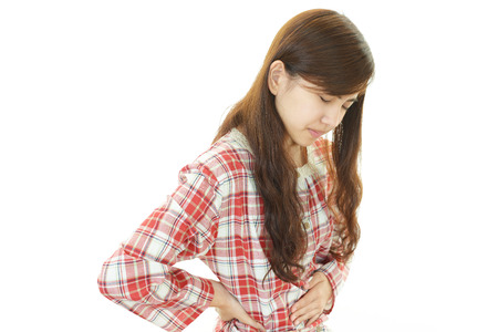 Women in poor physical conditionの写真素材