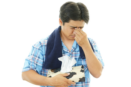 Man suffering from coldの写真素材