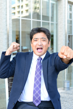 Businessman enjoying successの写真素材