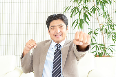 Businessman enjoying successの写真素材
