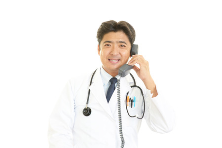 Smiling Asian medical doctorの写真素材