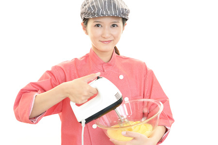 smiling female bakeryの写真素材