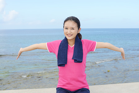 Beautiful woman doing stretchの写真素材