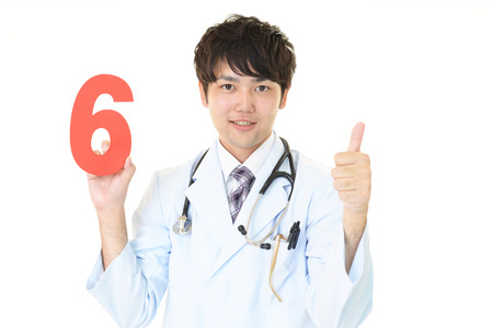 Asian medical doctor with a numberの写真素材
