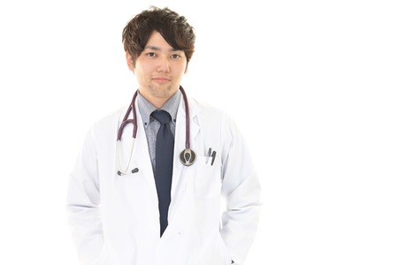Portrait male doctor isolated on white backgroundの写真素材