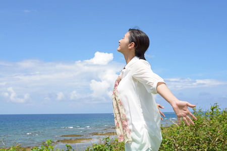 Relaxed woman by the sea