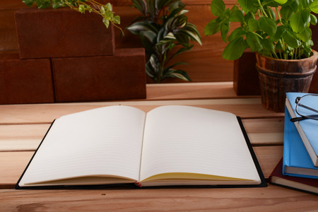 Notebooks with glassesの写真素材