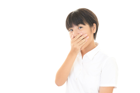 Surprised Asian girlの写真素材