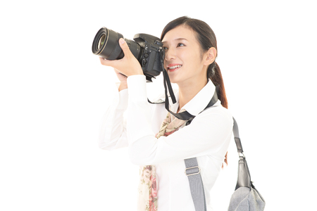 Woman with the cameraの写真素材