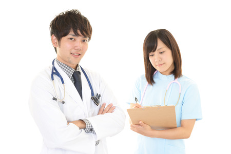 Smiling doctor and nurseの写真素材