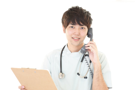 Smiling Asian medical doctorの写真素材