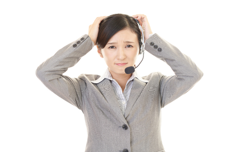 A stressed call center operatorの写真素材