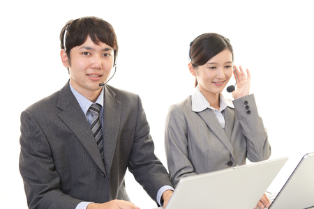 Smiling call center operatorsの写真素材