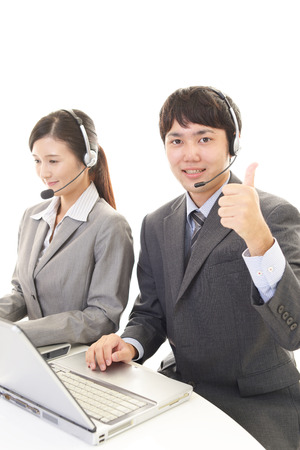 Smiling call center operatorsの写真素材