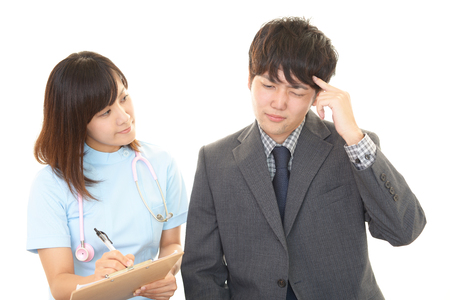 Depressed Asian businessmanの写真素材