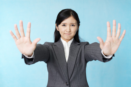 Woman making stop signの写真素材