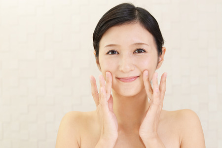 The woman who takes care of her faceの写真素材