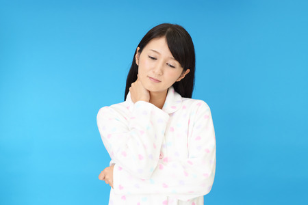 Woman who has a shoulder painの写真素材