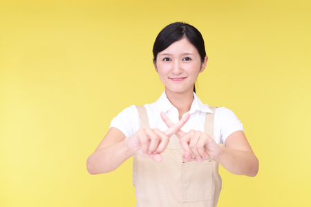 Women shows her intention of prohibitionの写真素材