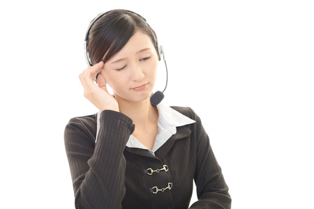A call center operator who has a headacheの写真素材