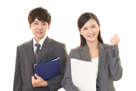 Smiling businessman and businesswomanの写真素材