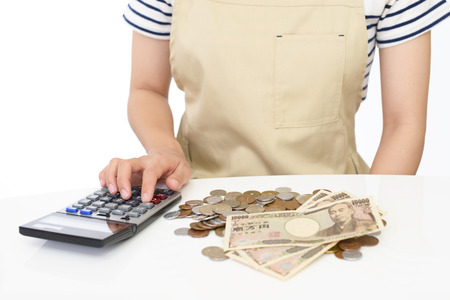 Woman with moneyの写真素材