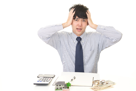 Disappointed Asian businessmanの写真素材