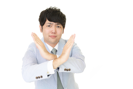 Man shows the sign of prohibitionの写真素材