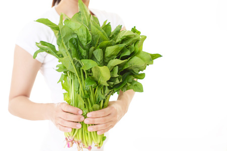 Woman having vegetablesの写真素材