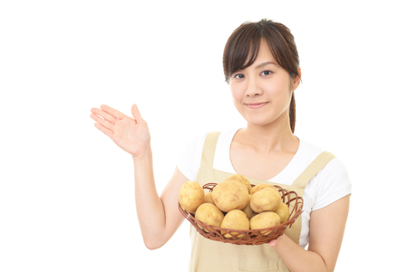 Woman having vegetablesの写真素材