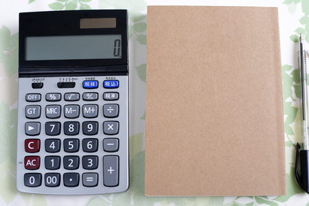 Calculator with notebookの写真素材