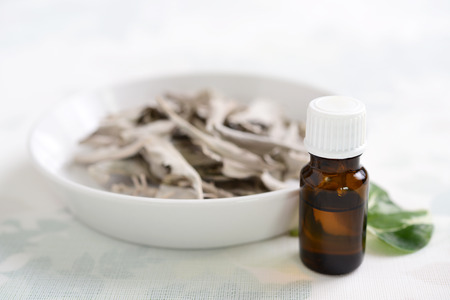 Essential oil with Dried white sageの写真素材