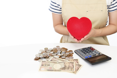 Housewife with moneyの写真素材