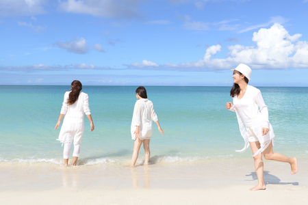 Women enjoy the sun.の写真素材
