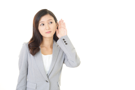 Woman listen carefullyの写真素材
