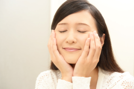 The woman who takes care of her faceの写真素材