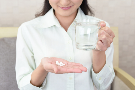 Woman who drinks supplementsの写真素材